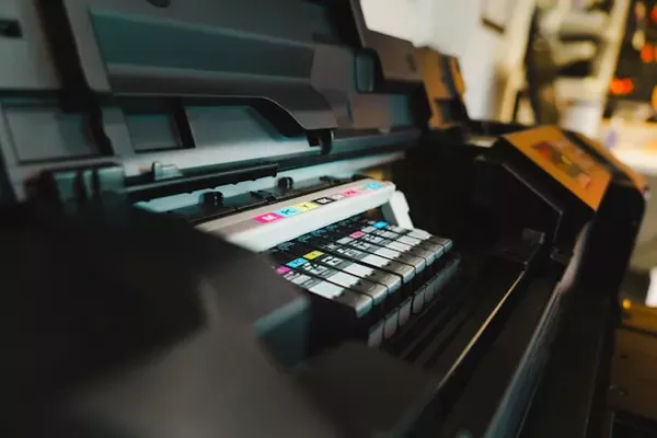 Modern East London print studio with flyers, brochures and booklets displayed on clean counters